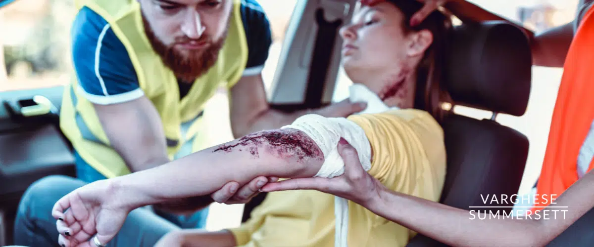 Lacerations on arm and neck from car windshield debris