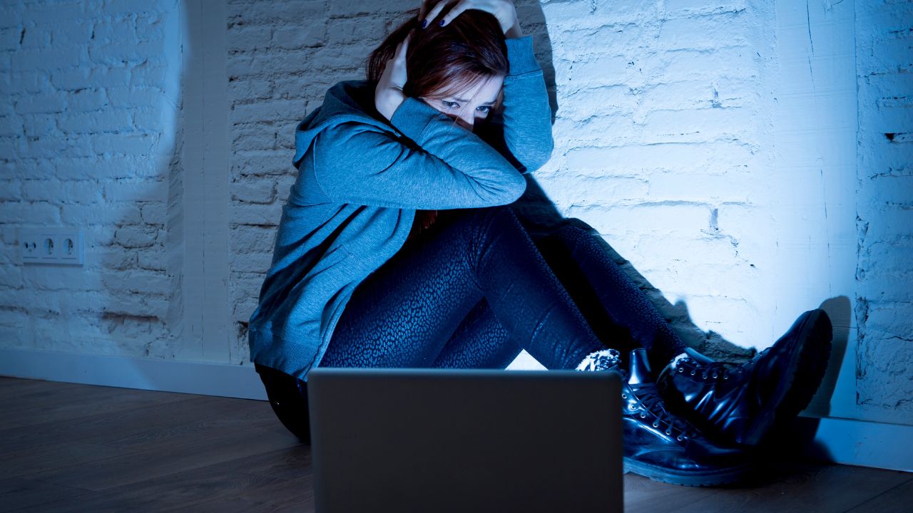girl watching horror movie