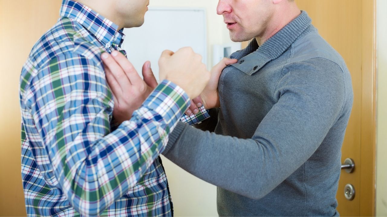 two guys fighting